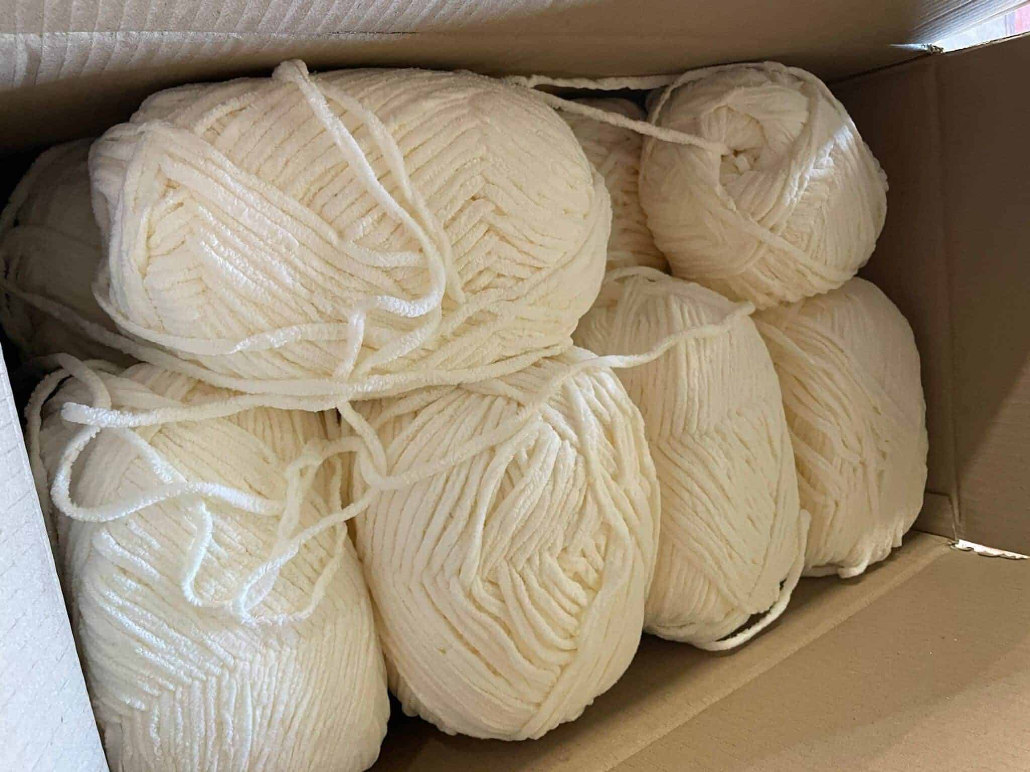 box with rolls of chenille yarn